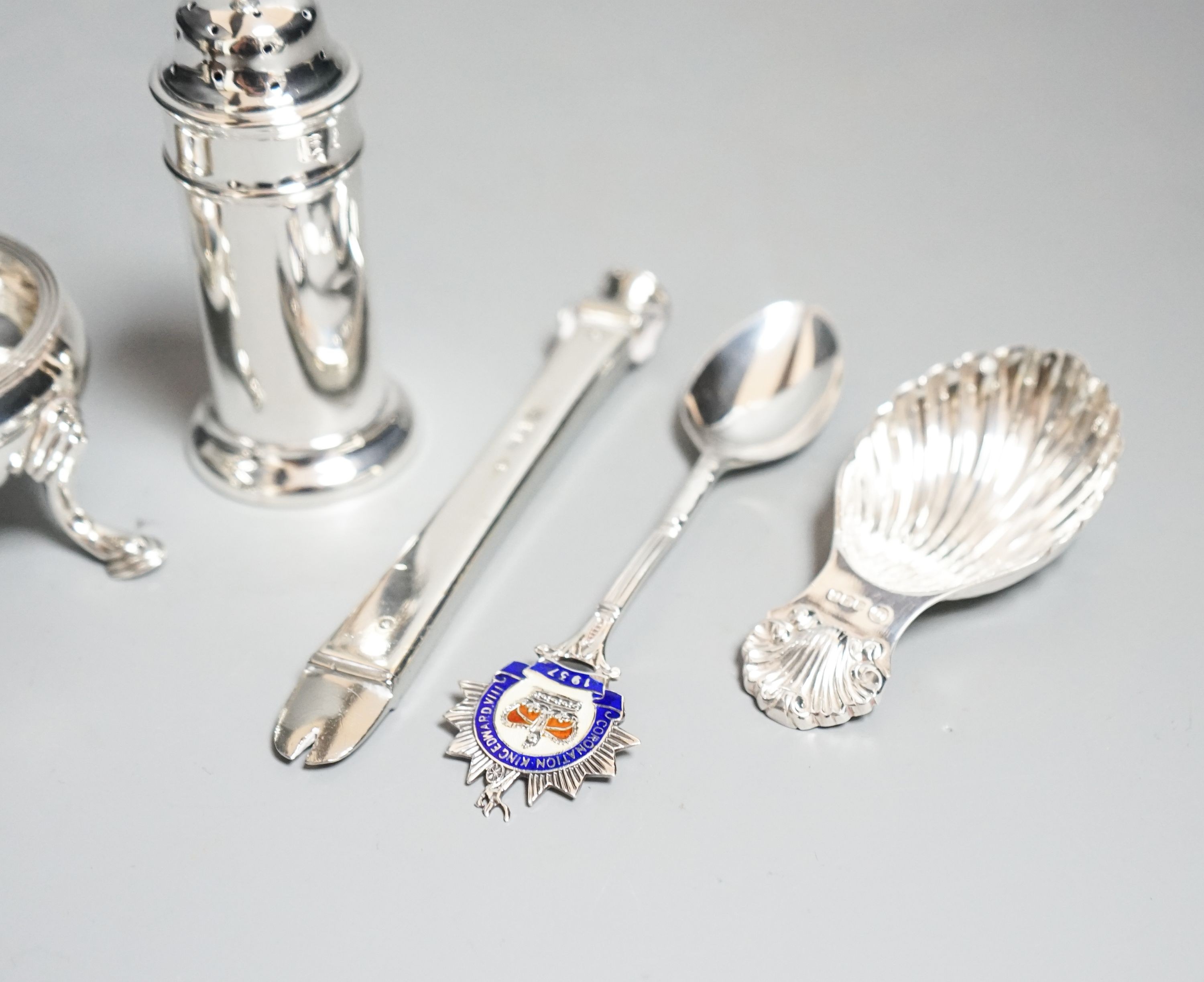 Small silver including a Georgian salt, caddy spoon, pepperette etc.